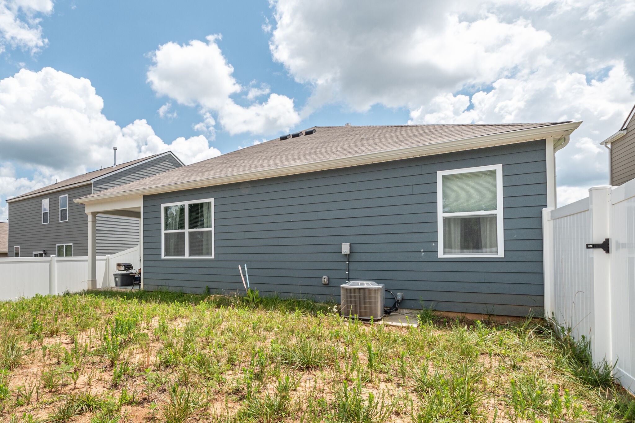 1122 Woodbridge Boulevard Lebanon, TN 37090 - Photo 29 of 30 a view of a house with a yard