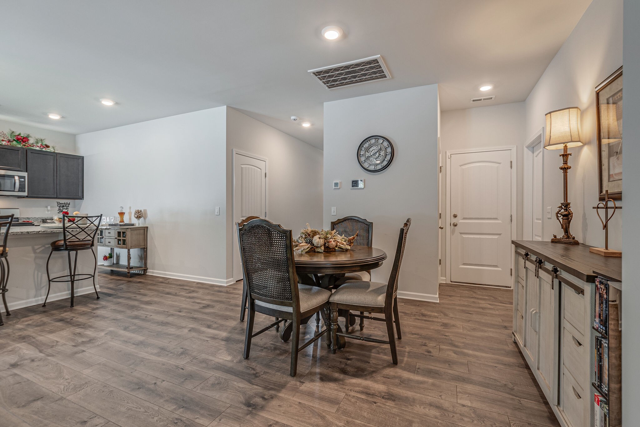 1122 Woodbridge Boulevard Lebanon, TN 37090 - Photo 9 of 30 a view of a dining room with furniture and a kitchen
