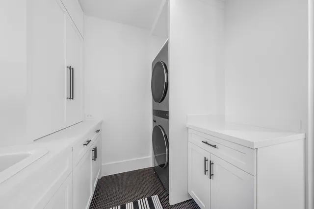 a spacious bedroom with a bed and window