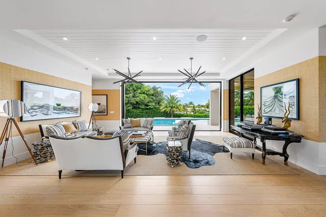a living room with fireplace furniture and a flat screen tv