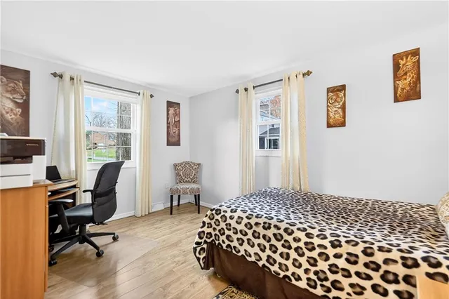 a front view of a house with yard