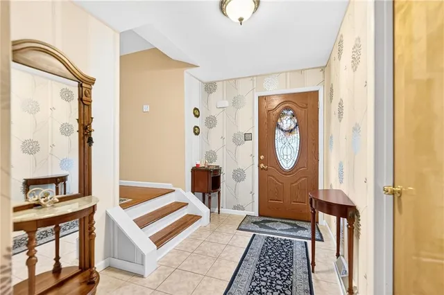 a bathroom with a tub and a shower