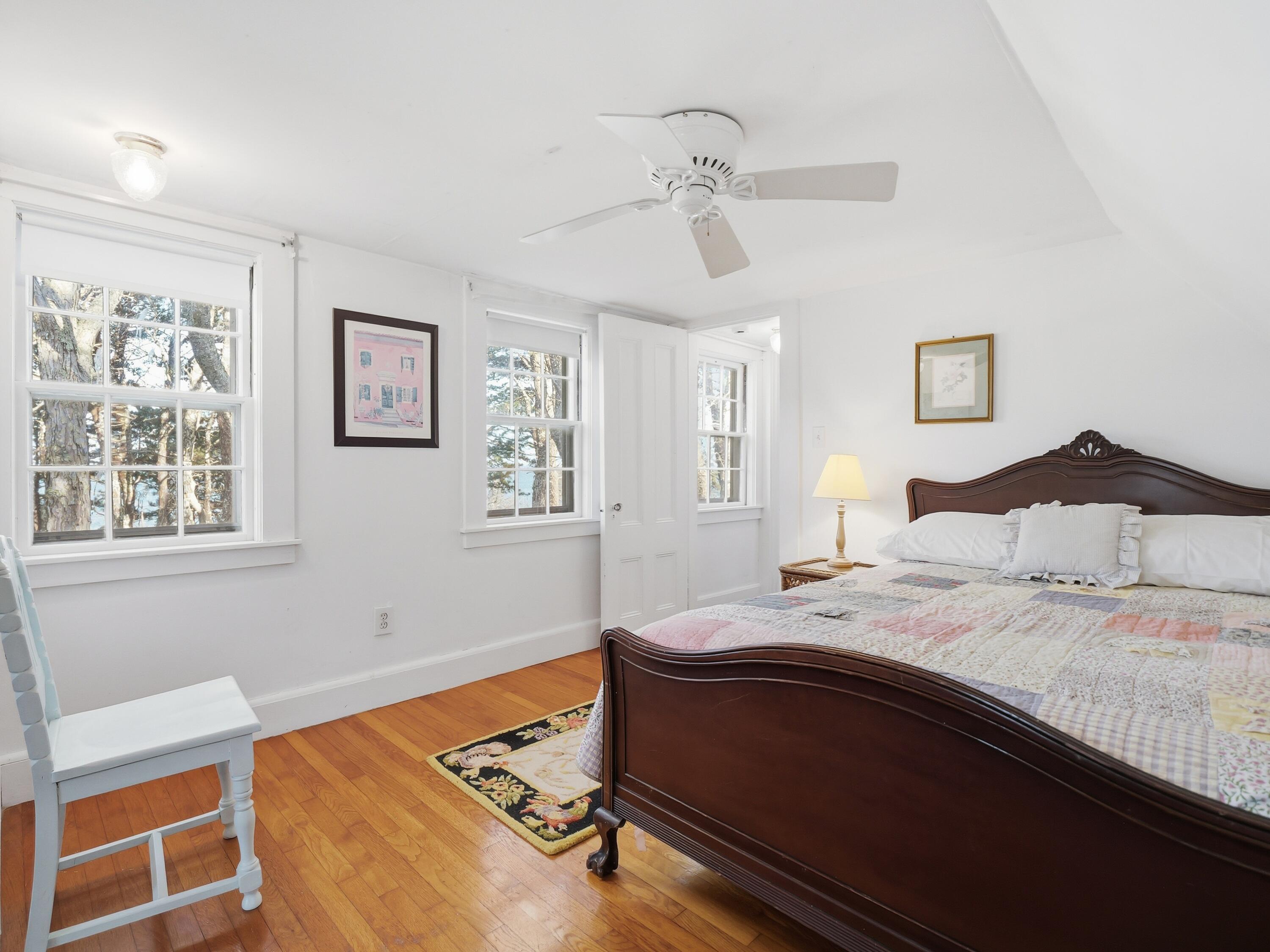 190 Vineyard Road Cotuit, MA 02635 - Photo 35 of 41 a bedroom with a bed and window