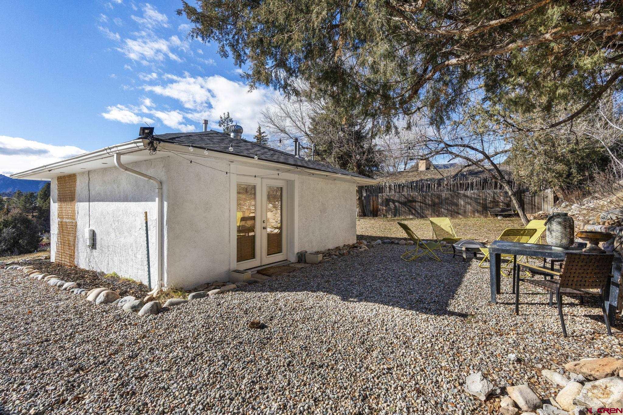2 Carol Drive Durango, CO 81301 - Photo 27 of 41 a backyard of a house with table and chairs