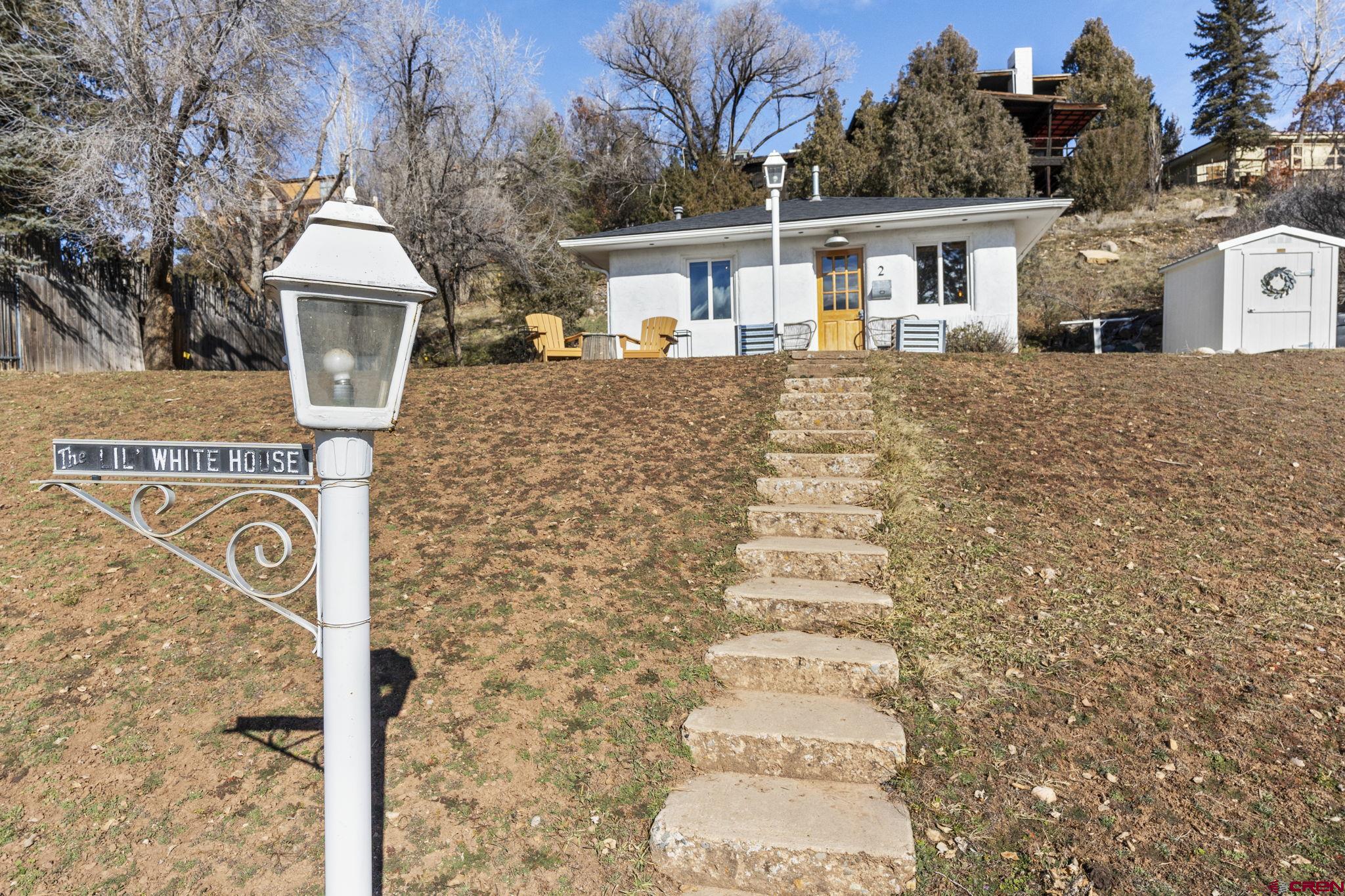 2 Carol Drive Durango, CO 81301 - Photo 38 of 41 a front view of a house with a yard