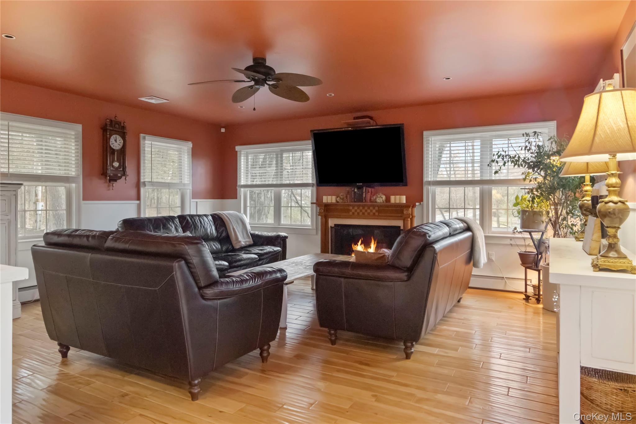 195 Pressler Road Wallkill, NY 12589 - Photo 14 of 47 Hard wood floors,lots of windows for natural light and propane fireplace