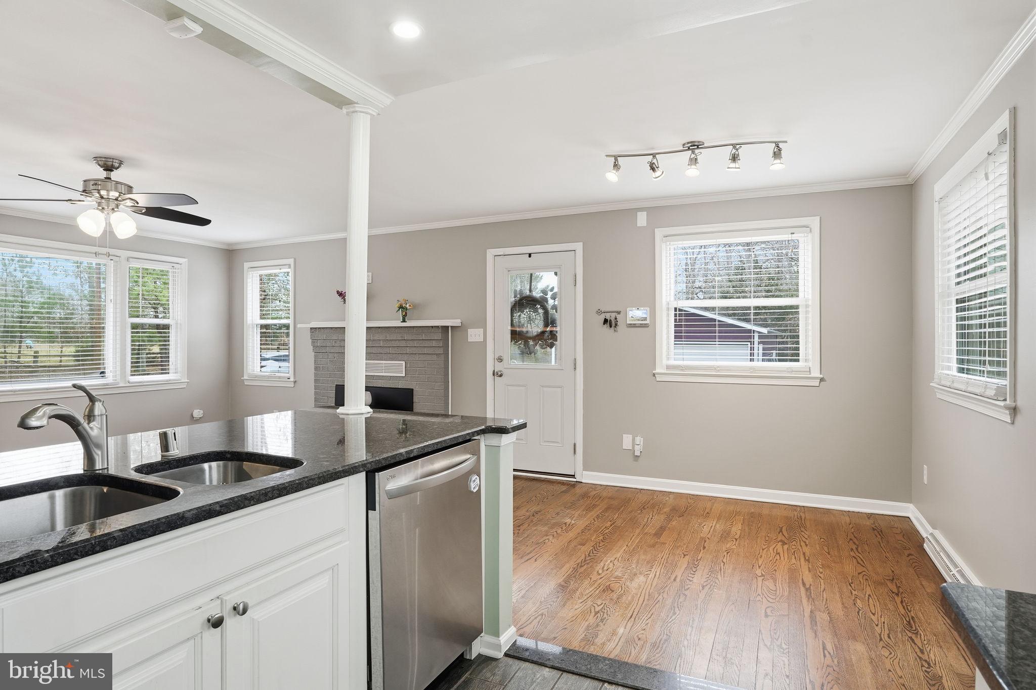 16402 Baden Naylor Road Brandywine, MD 20613 - Photo 14 of 37 a kitchen with granite countertop a sink cabinets and window