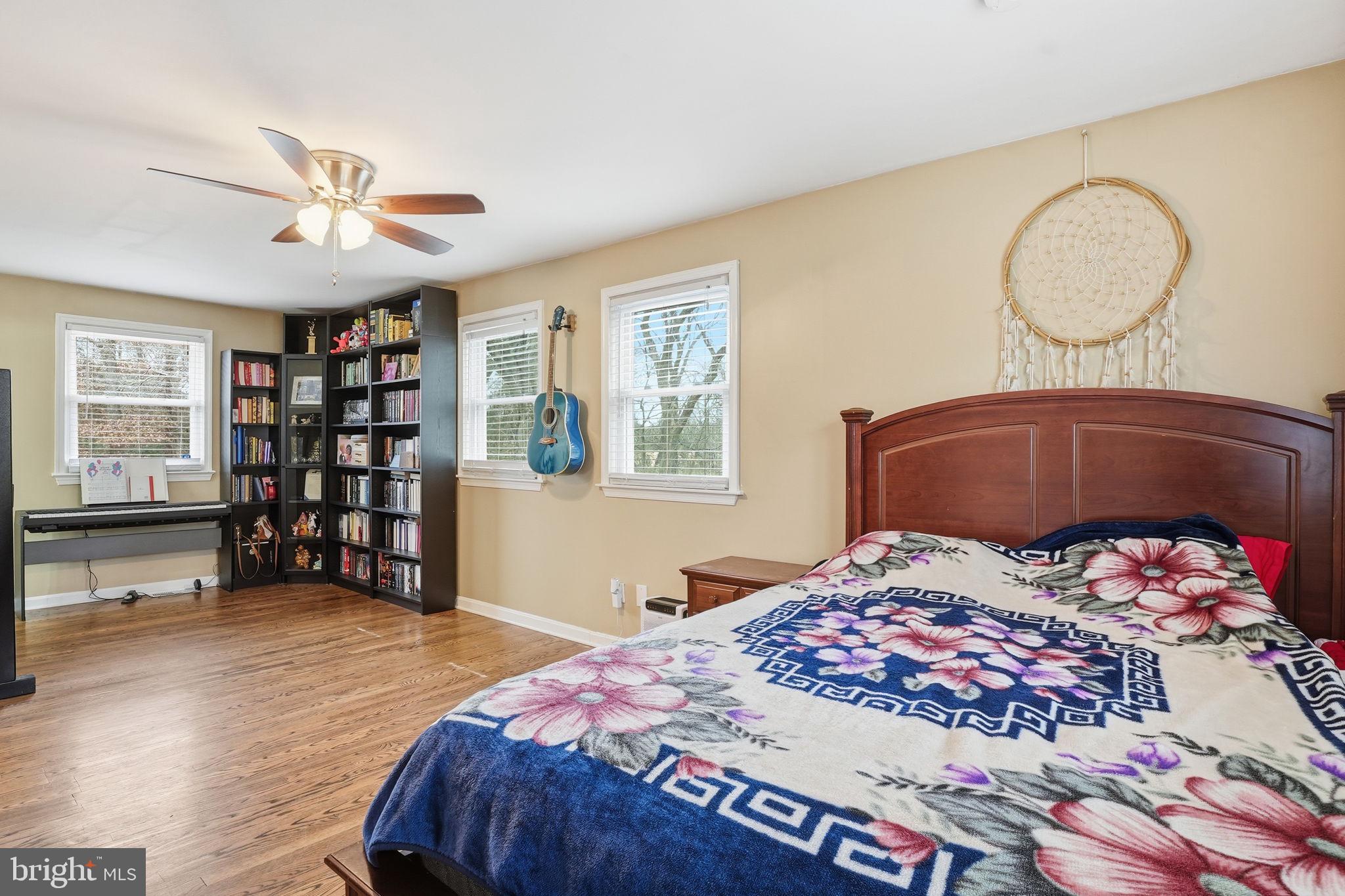 16402 Baden Naylor Road Brandywine, MD 20613 - Photo 18 of 37 a bedroom with a large bed and a window