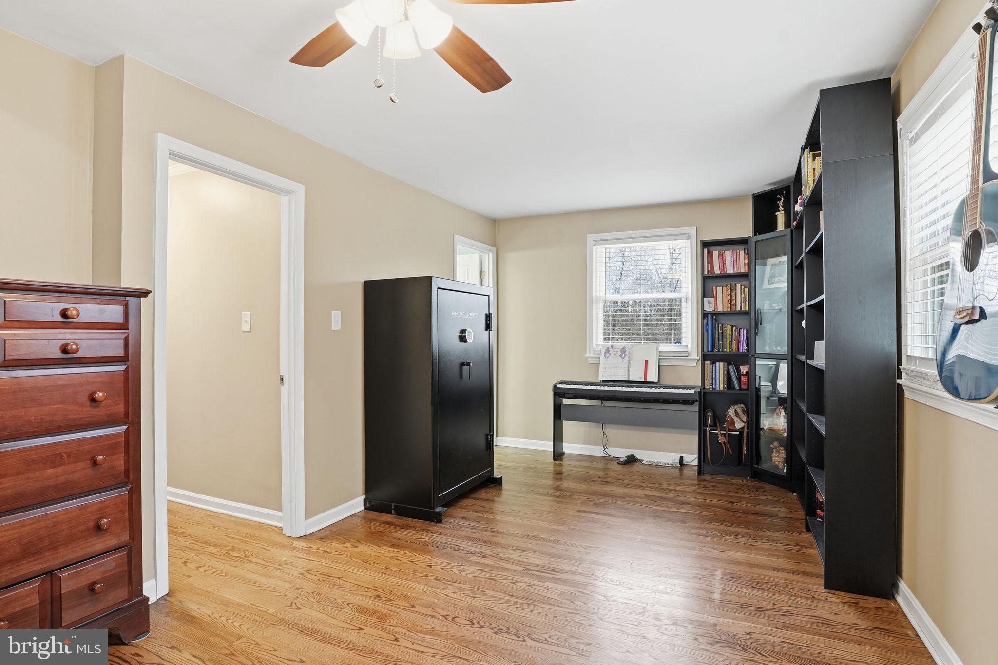 16402 Baden Naylor Road Brandywine, MD 20613 - Photo 19 of 37 a view of a livingroom with furniture and an empty room