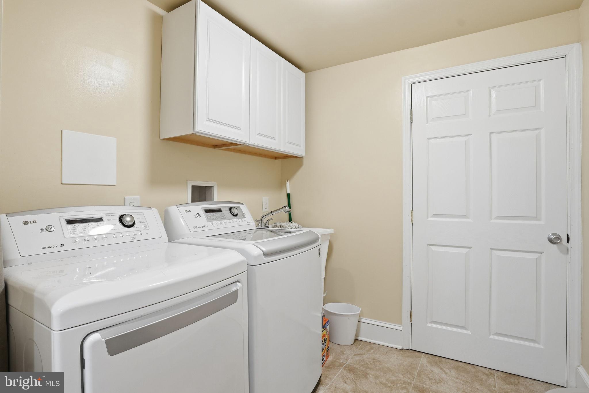 16402 Baden Naylor Road Brandywine, MD 20613 - Photo 22 of 37 a utility room with dryer and washer