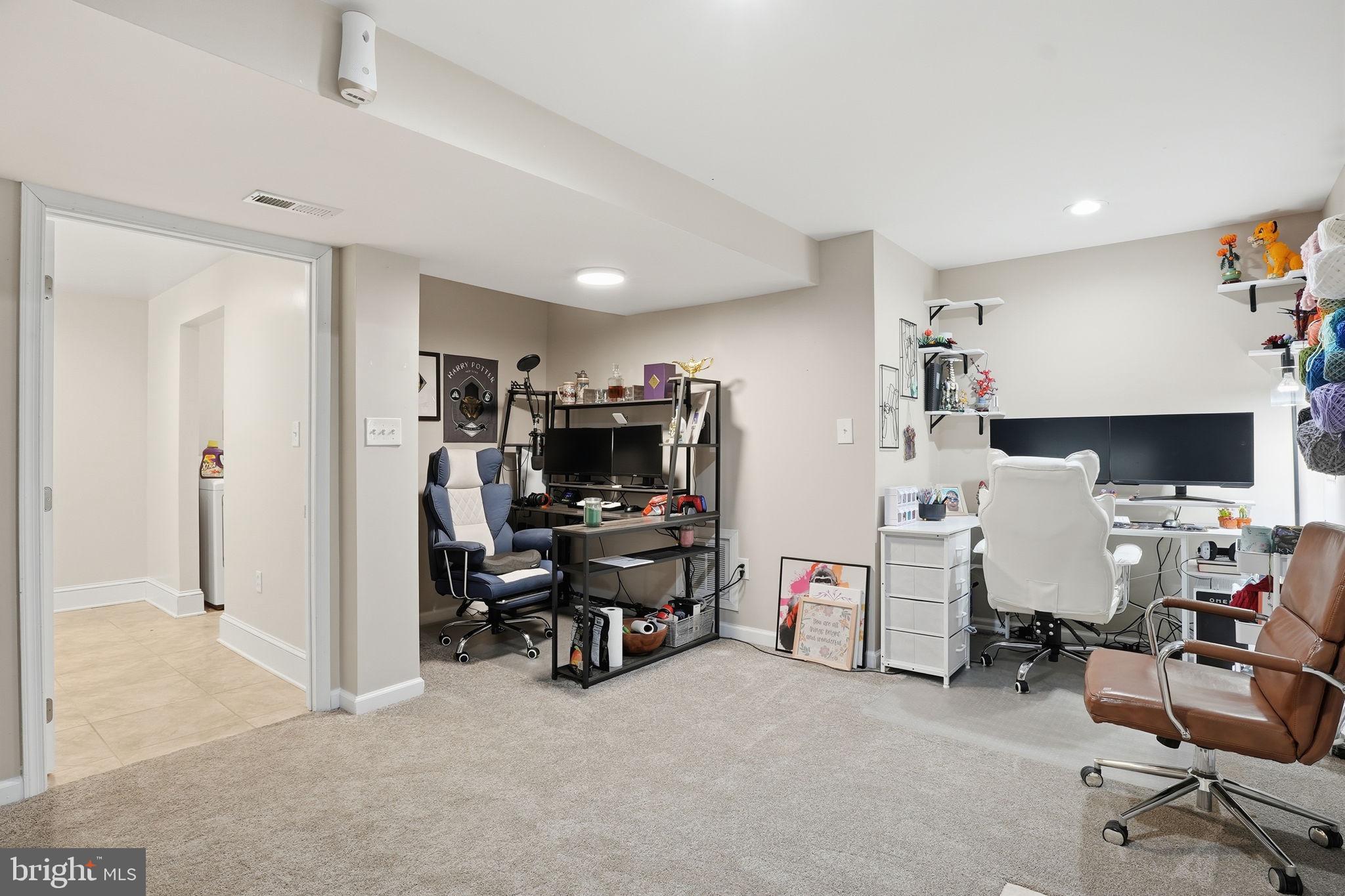 16402 Baden Naylor Road Brandywine, MD 20613 - Photo 23 of 37 a view of a livingroom with workspace and a couch