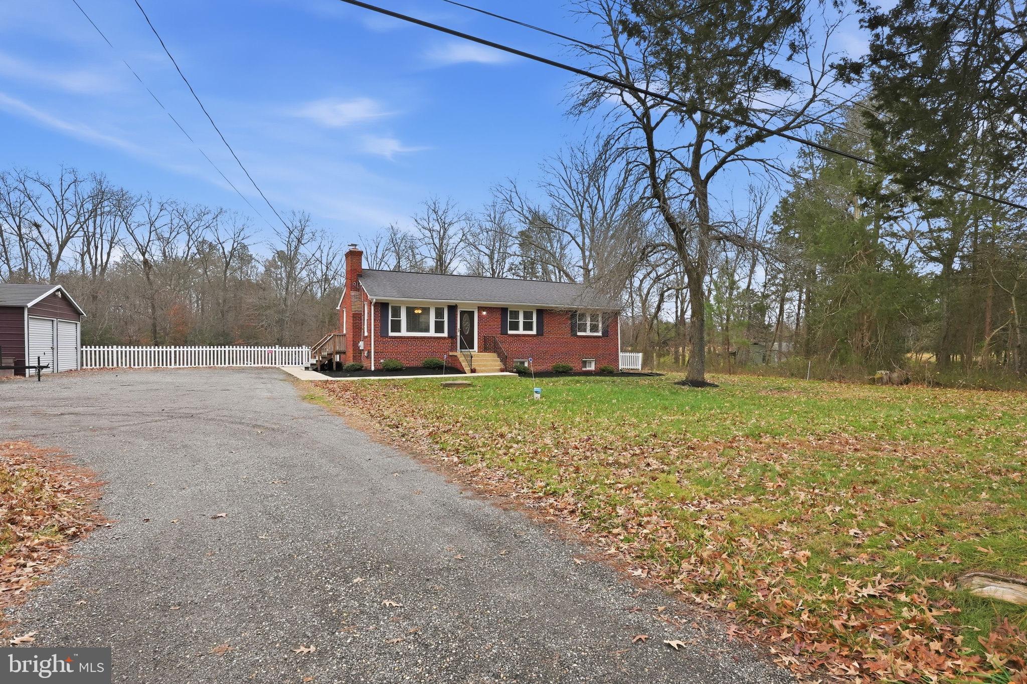 16402 Baden Naylor Road Brandywine, MD 20613 - Photo 3 of 37 a view of a house with a yard