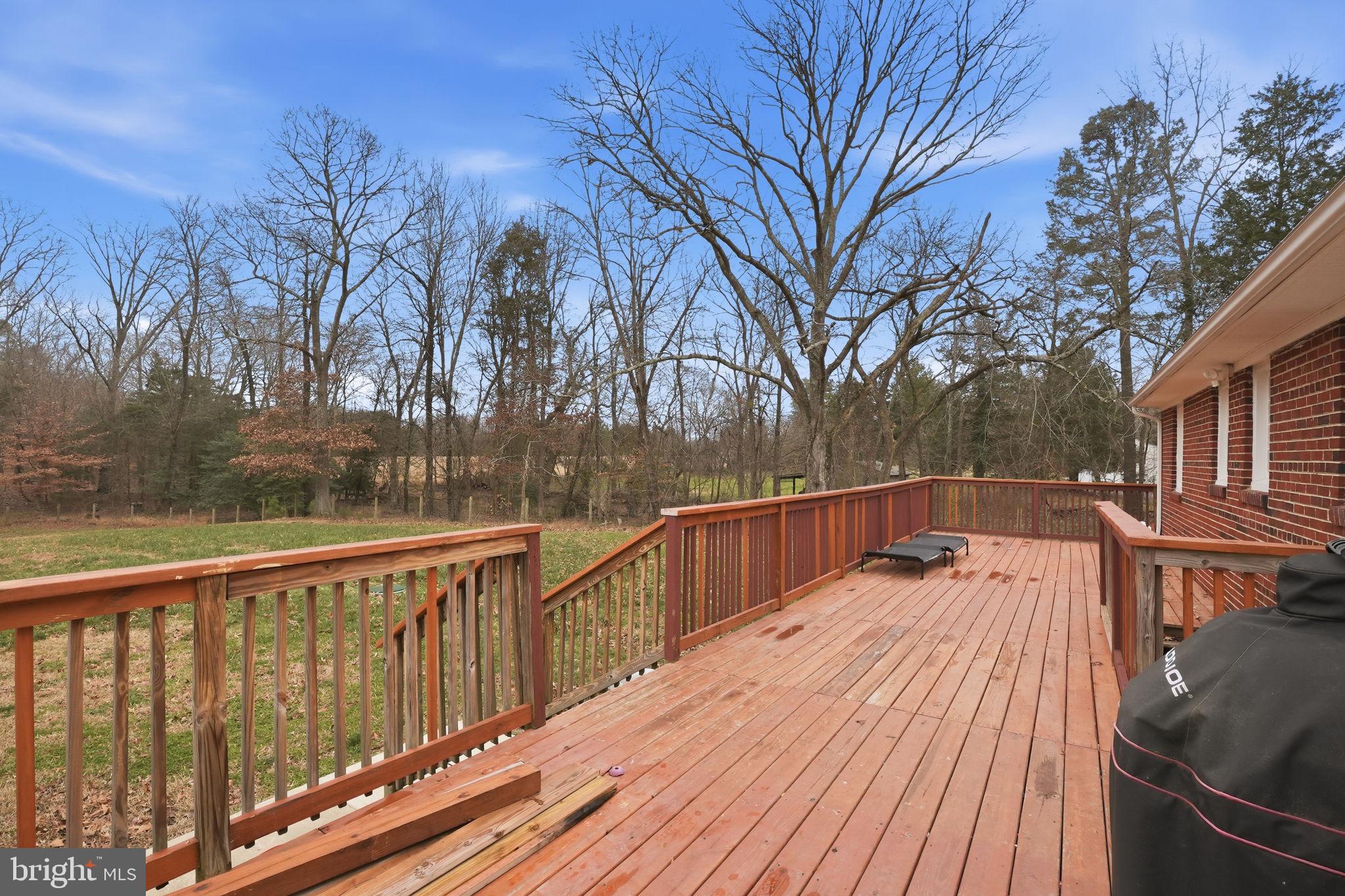 16402 Baden Naylor Road Brandywine, MD 20613 - Photo 33 of 37 a view of wooden deck with a patio