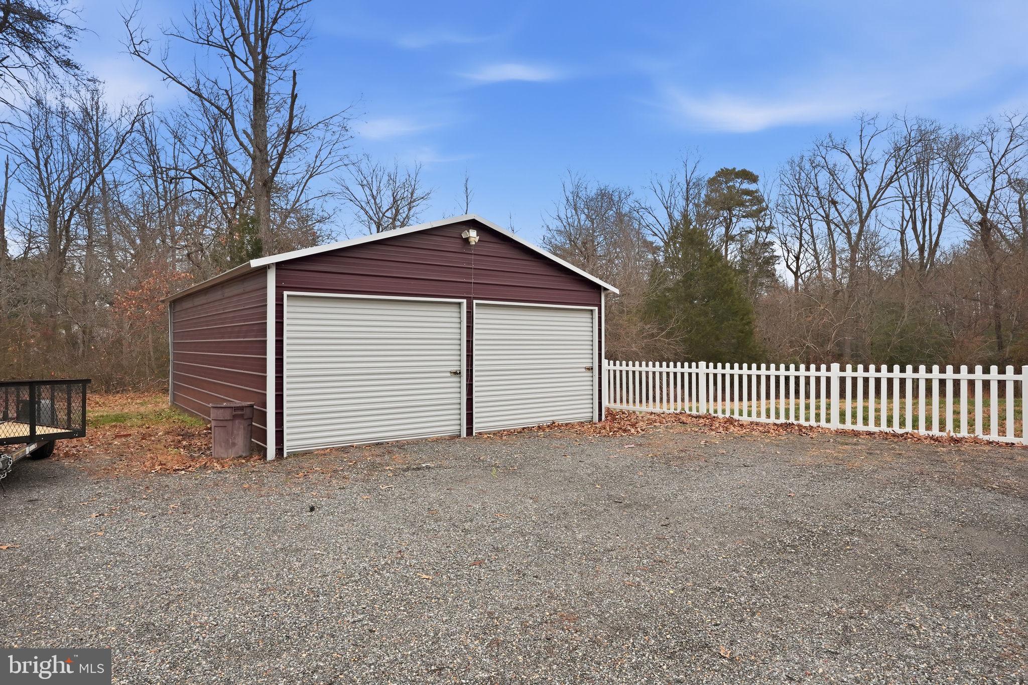 16402 Baden Naylor Road Brandywine, MD 20613 - Photo 4 of 37 a view of a house with a yard and garage