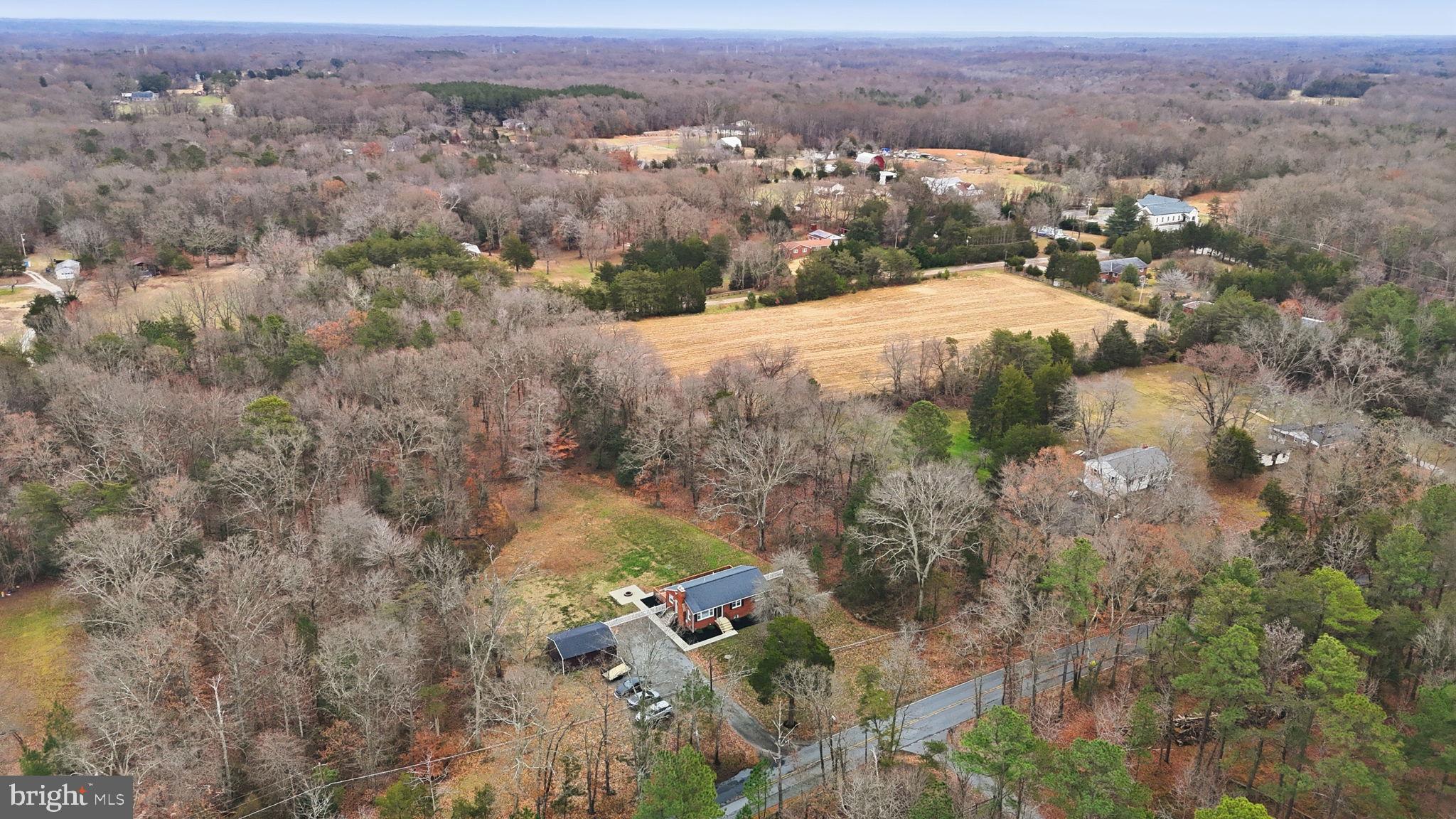 16402 Baden Naylor Road Brandywine, MD 20613 - Photo 5 of 37 an aerial view of residential houses with outdoor space and trees