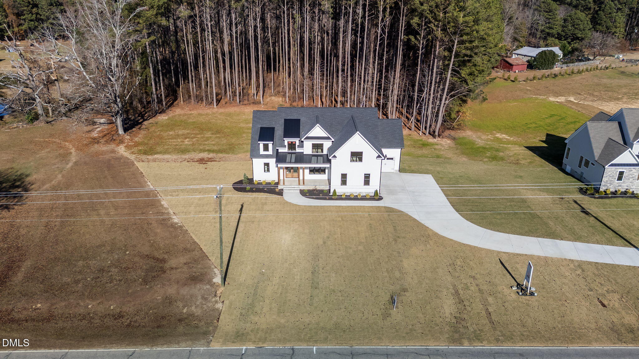 2590 Lassiter Road Four Oaks, NC 27524 - Photo 62 of 72 a view of a swimming pool with a yard