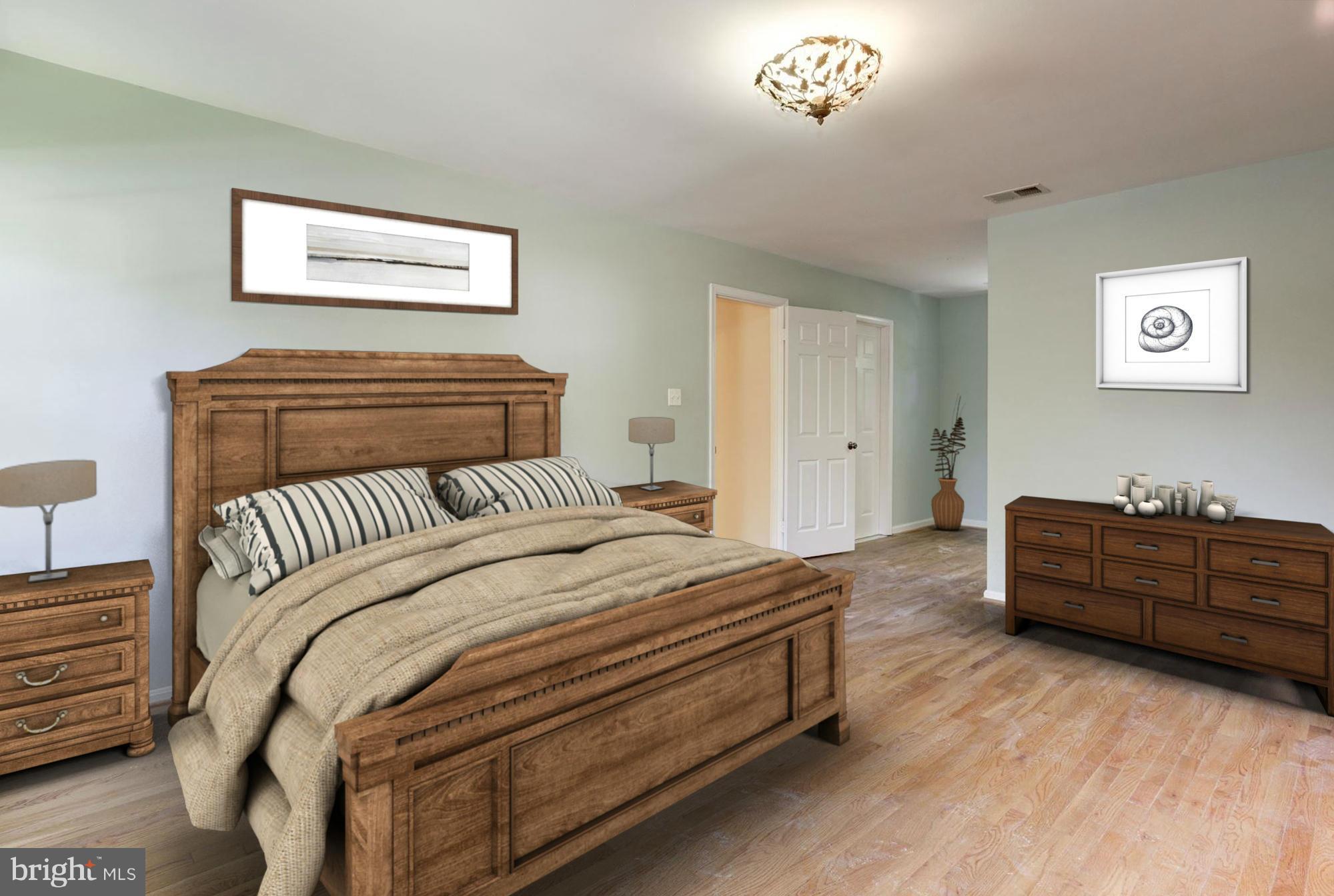9019 Edgepark Road Vienna, VA 22182 - Photo 12 of 30 a bedroom with a bed and a couch