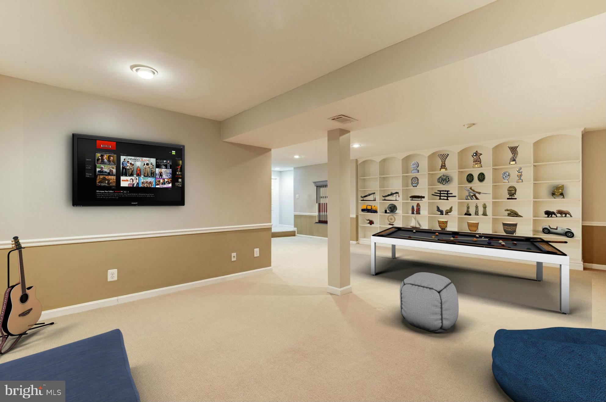9019 Edgepark Road Vienna, VA 22182 - Photo 19 of 30 a living room with furniture and a flat screen tv