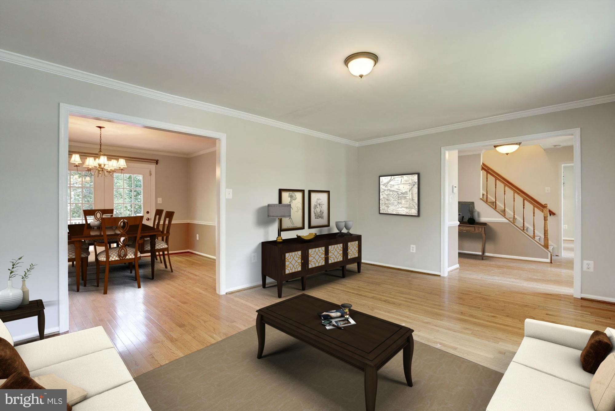 9019 Edgepark Road Vienna, VA 22182 - Photo 4 of 30 a living room with furniture and a wooden floor