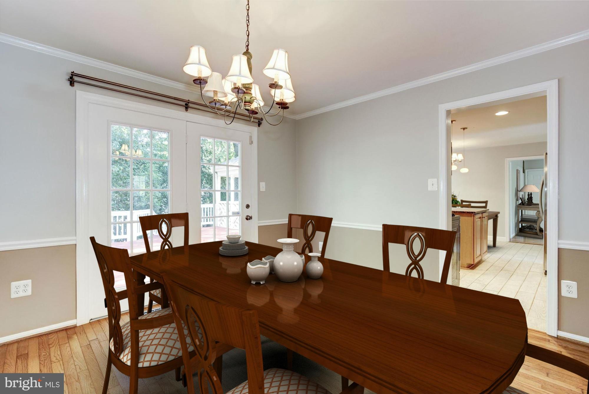 9019 Edgepark Road Vienna, VA 22182 - Photo 5 of 30 a view of a dining room with furniture window and wooden floor