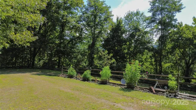 a view of a chair and table in the outdoor space