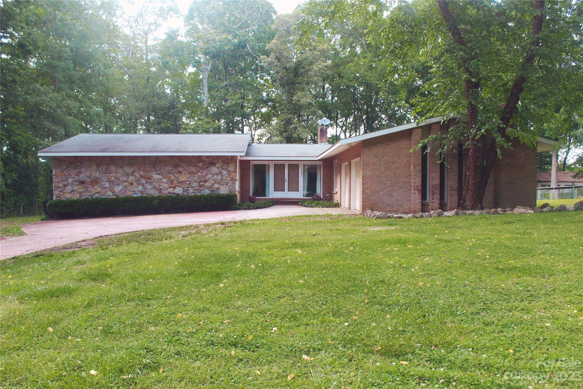 131 Mozelle Road Cherryville, NC 28021 - Photo 1 of 23 front view of a house with a yard
