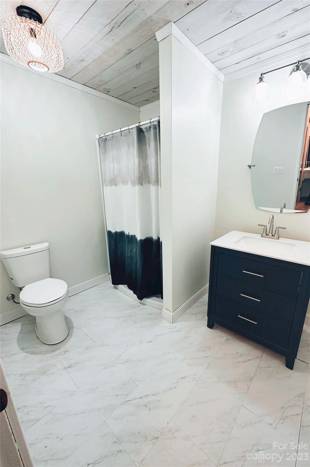 131 Mozelle Road Cherryville, NC 28021 - Photo 12 of 23 a bathroom with a sink and a mirror