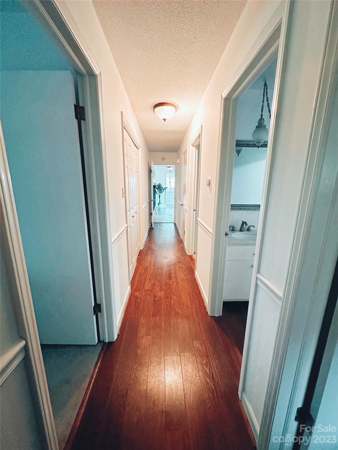 131 Mozelle Road Cherryville, NC 28021 - Photo 13 of 23 a view of a hallway with wooden floor and staircase