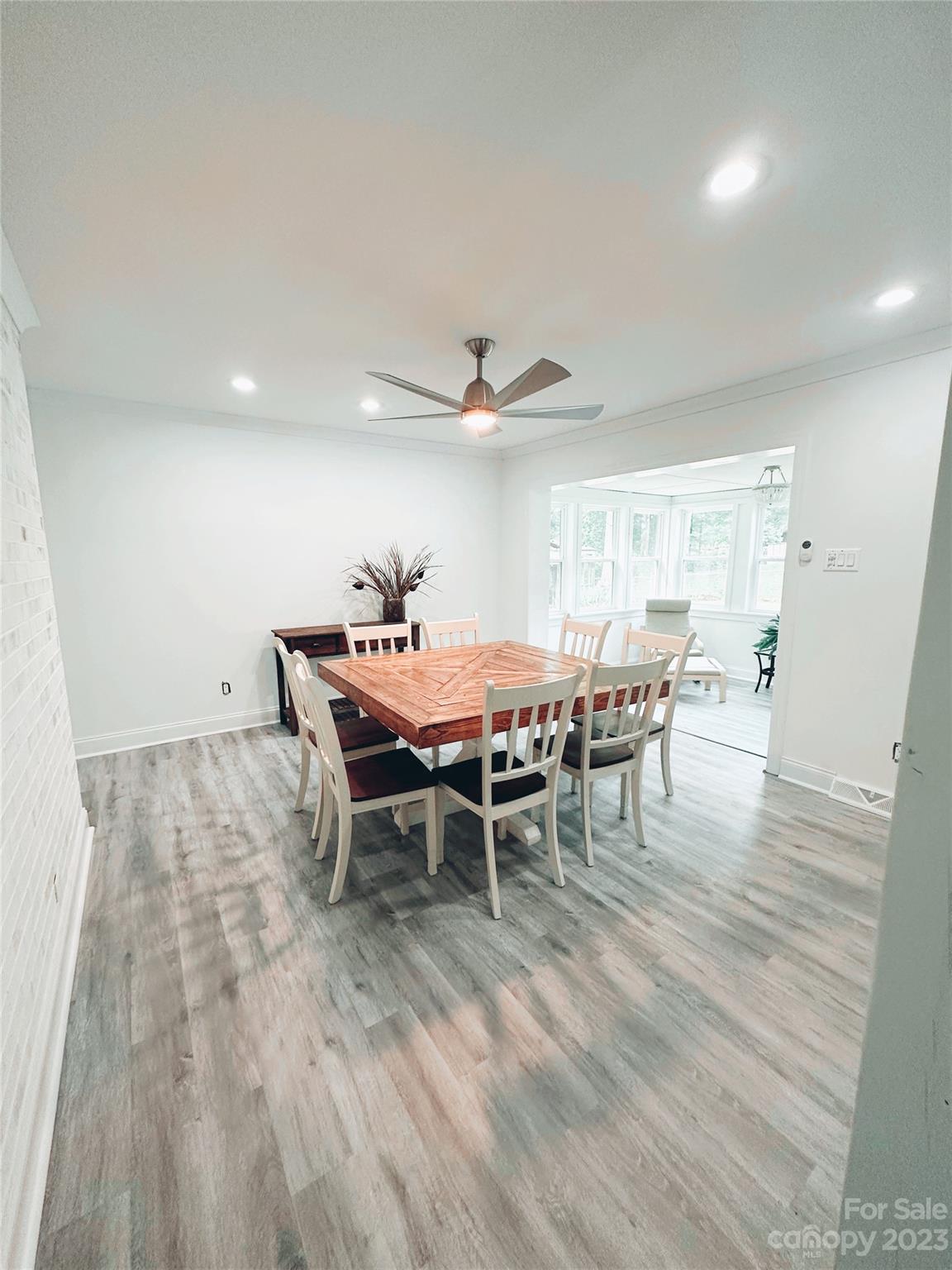 131 Mozelle Road Cherryville, NC 28021 - Photo 16 of 23 a dining room with furniture and wooden floor