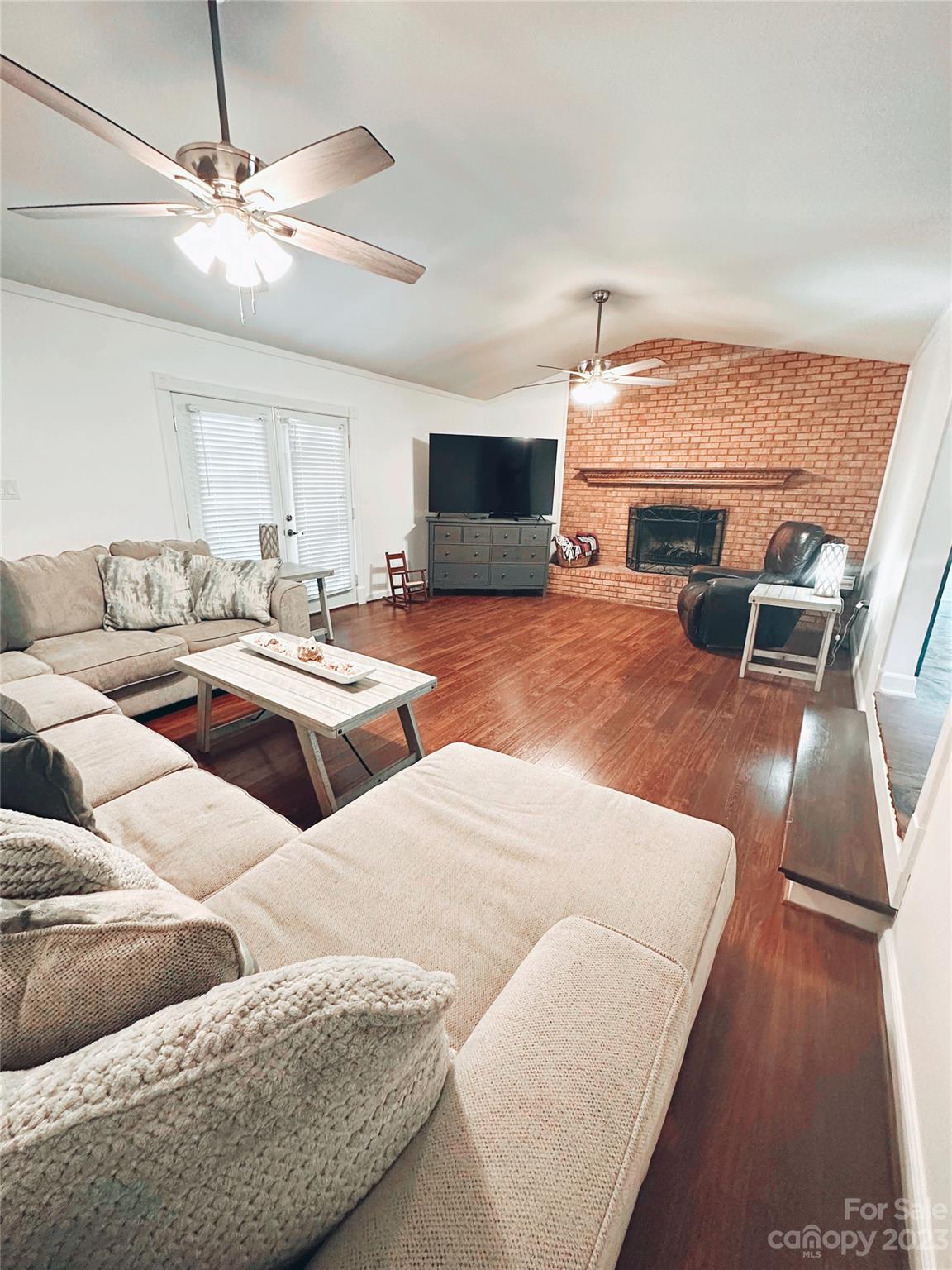 131 Mozelle Road Cherryville, NC 28021 - Photo 5 of 23 a living room with furniture and a fireplace
