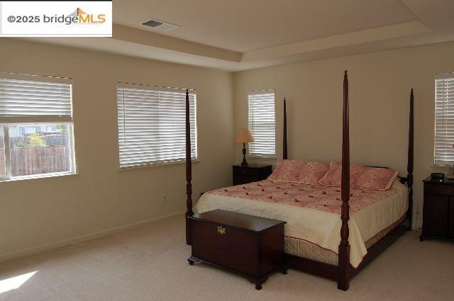 760 Waterville Drive Brentwood, CA 94513 - Photo 6 of 10 a bedroom with a bed lamp and window