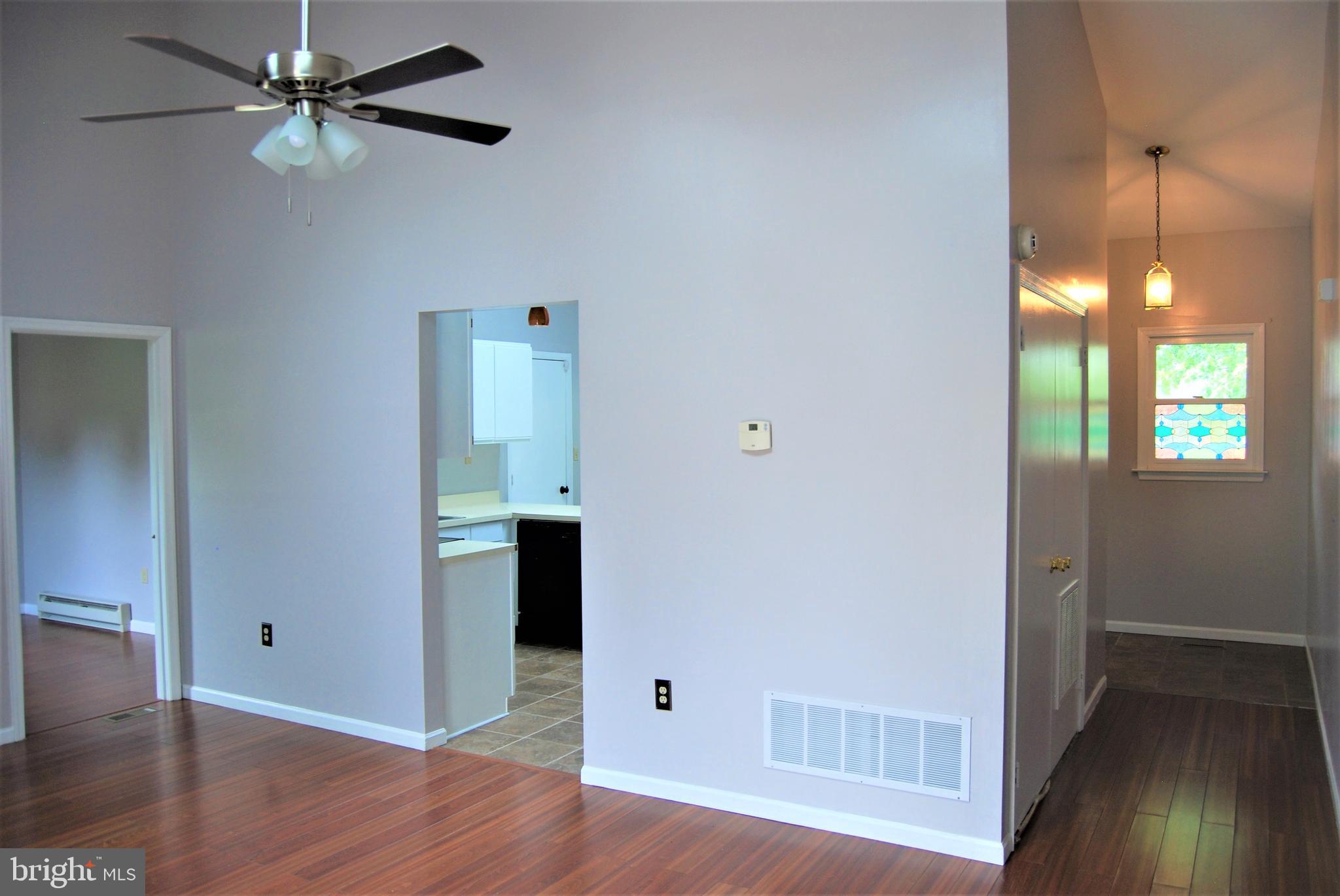 1013 Rill Road Reading, PA 19606 - Photo 12 of 26 Livingroom, small bedroom, kitchen & main entrance