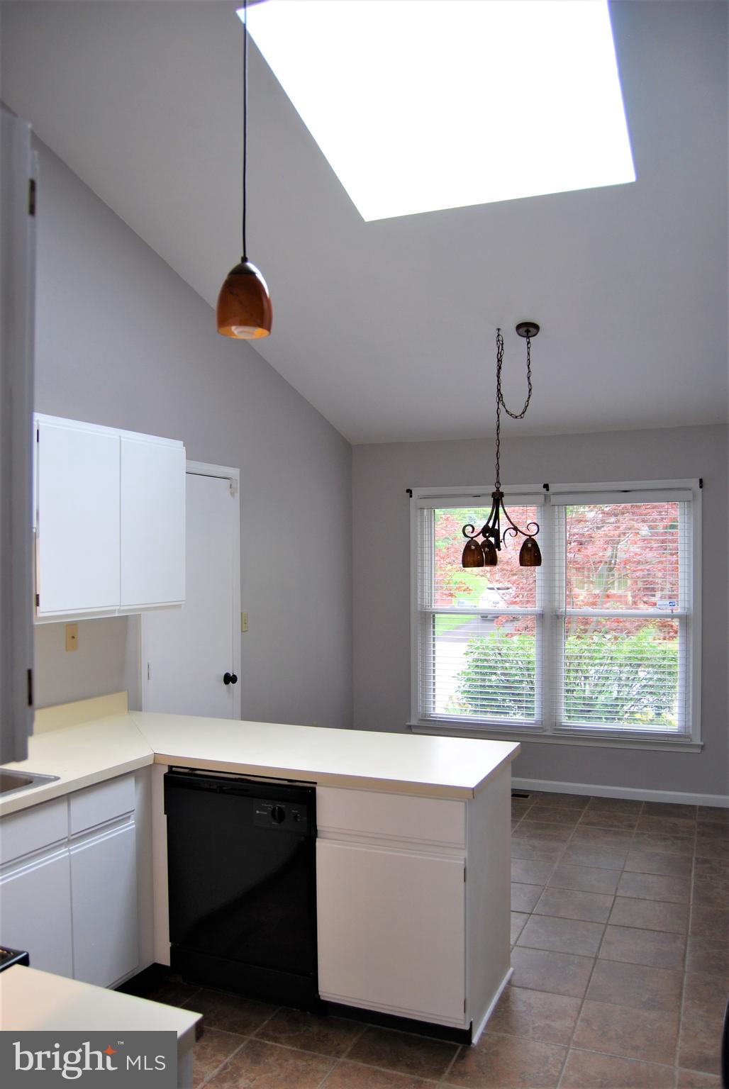 1013 Rill Road Reading, PA 19606 - Photo 16 of 26 Kitchen with large skylight & dinning area