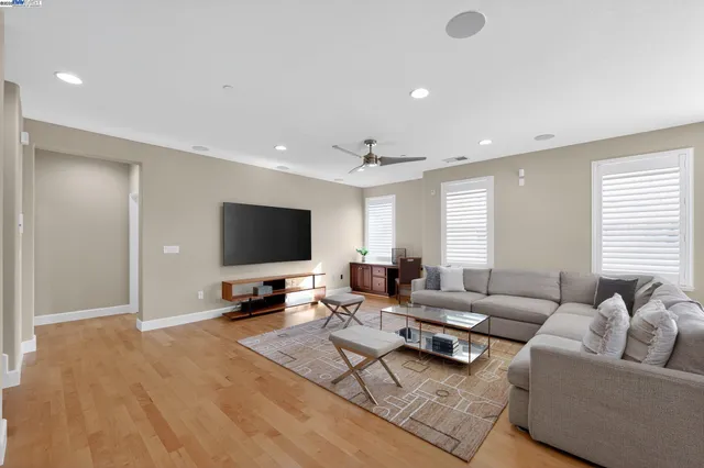 a kitchen with sink stove and cabinets
