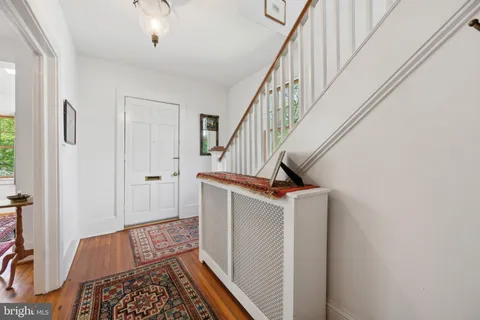 a view of entryway with wooden floor