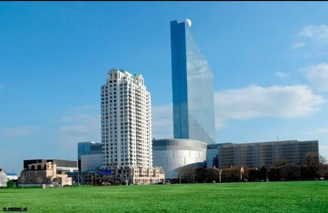 a front view of a building with garden
