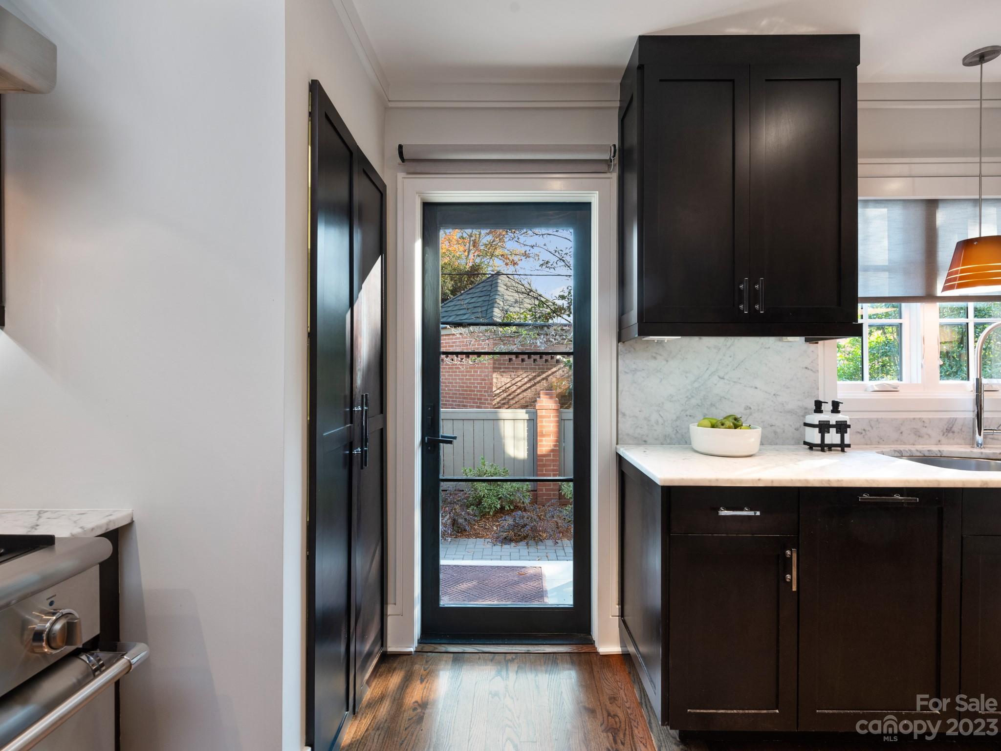 2743 Normandy Road Charlotte, NC 28209 - Photo 15 of 43 a en suite bathroom with a sink and a mirror
