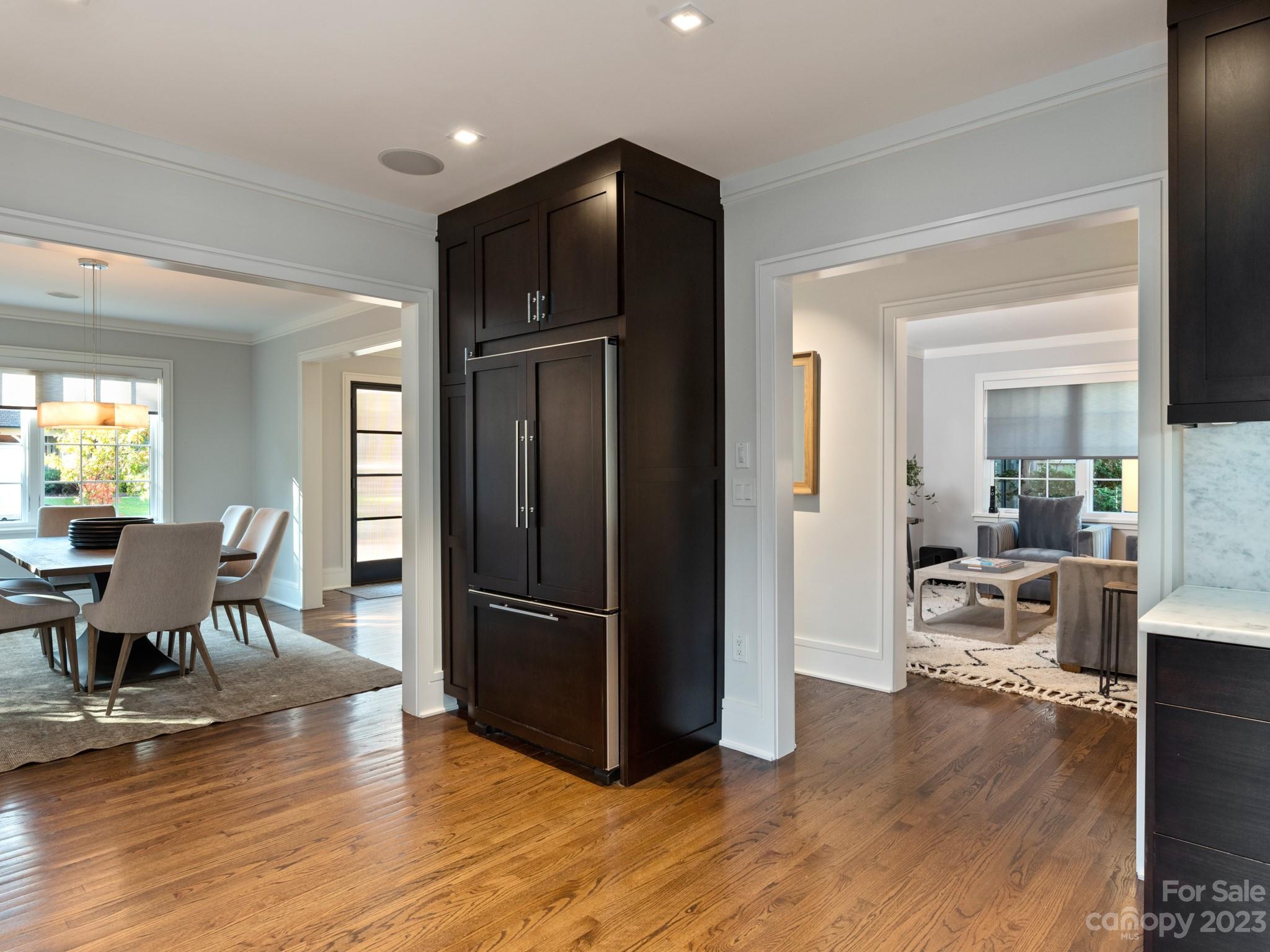 2743 Normandy Road Charlotte, NC 28209 - Photo 17 of 43 a view of a dining room with furniture window and wooden floor