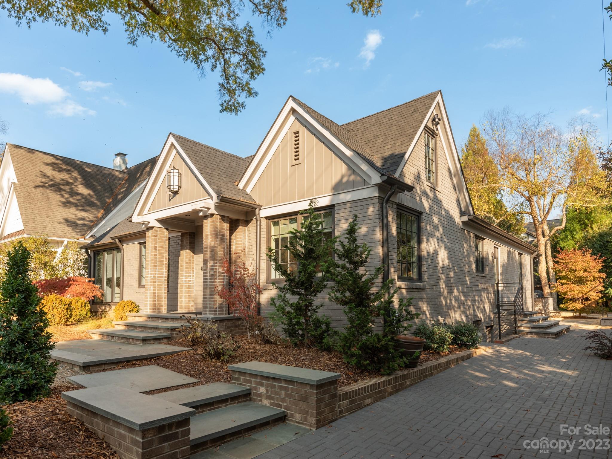 2743 Normandy Road Charlotte, NC 28209 - Photo 2 of 43 a front view of a house with a yard