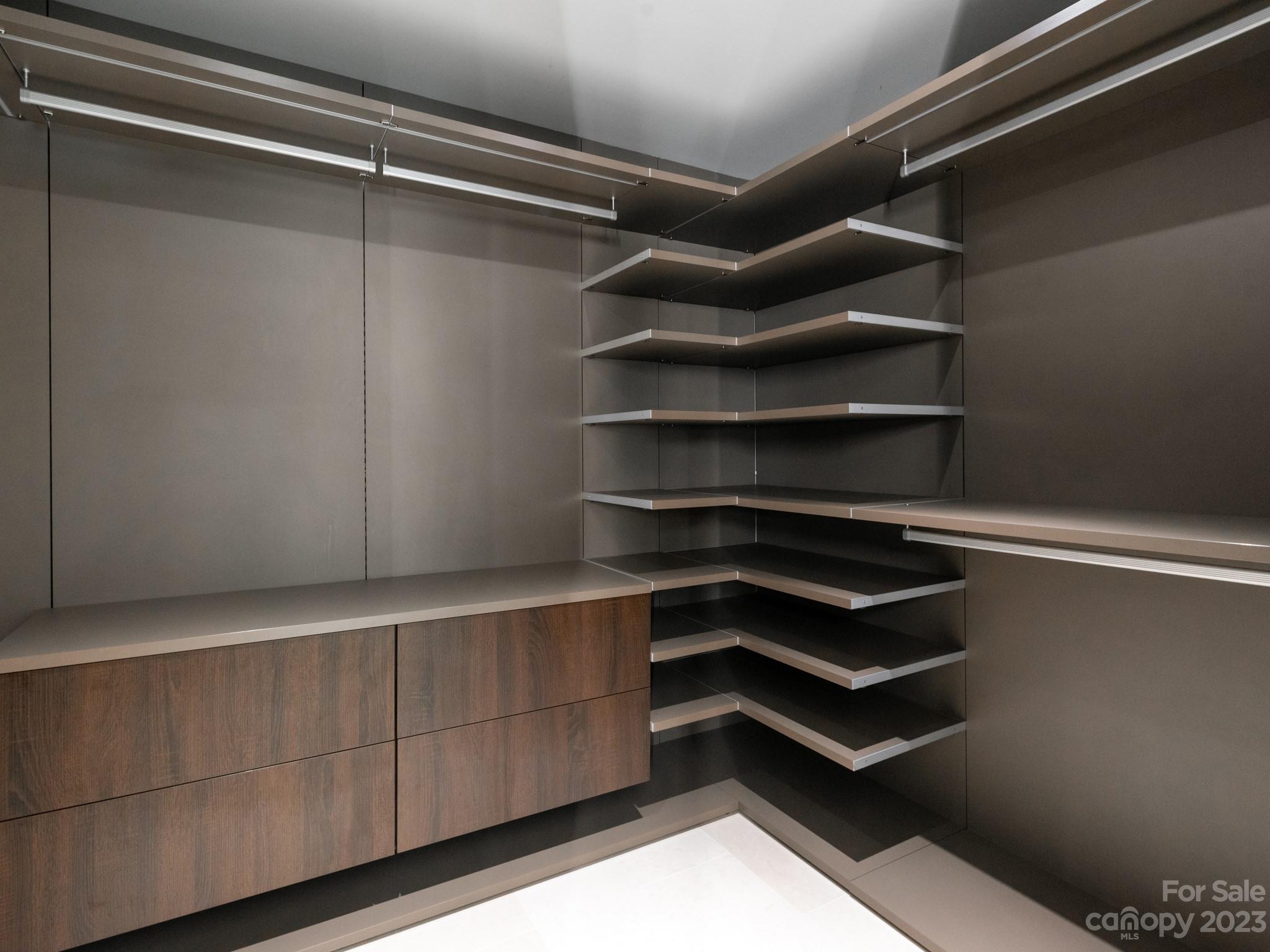 2743 Normandy Road Charlotte, NC 28209 - Photo 31 of 43 a view of room with racks on the wall