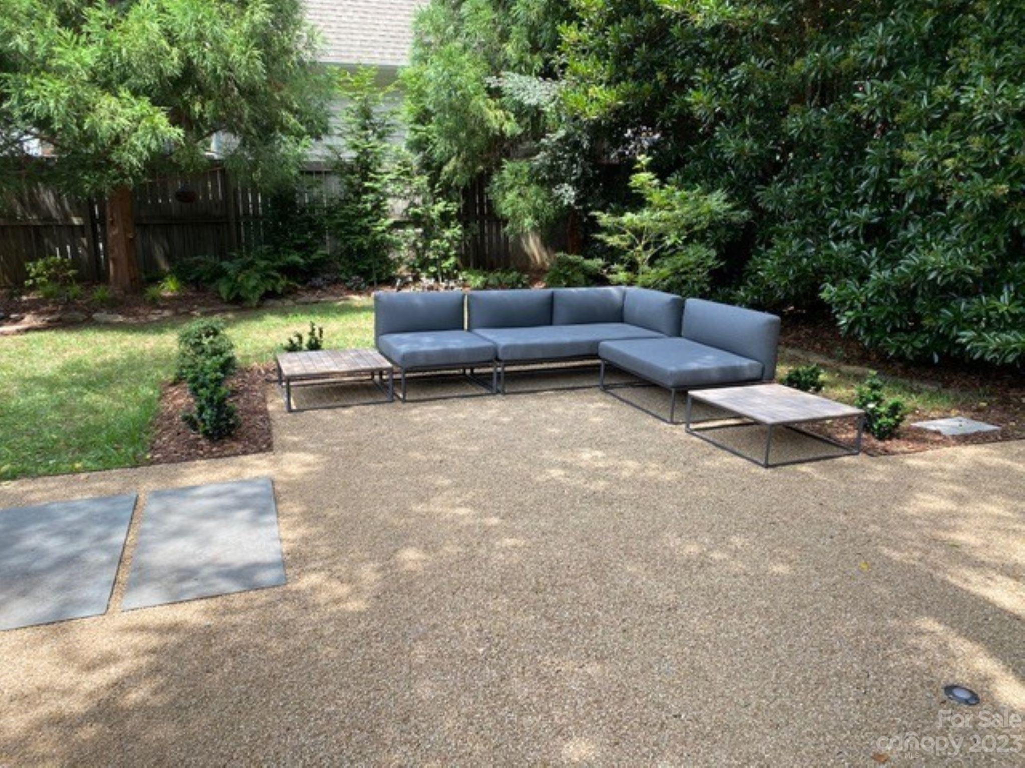 2743 Normandy Road Charlotte, NC 28209 - Photo 36 of 43 a view of backyard with furniture and garden
