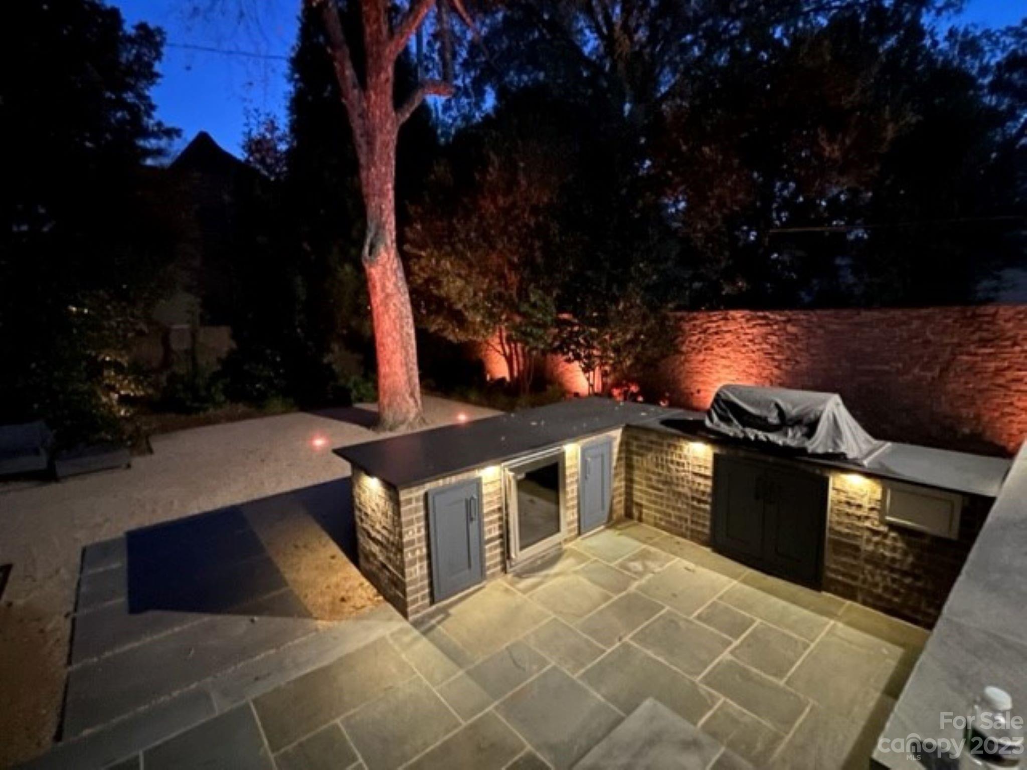2743 Normandy Road Charlotte, NC 28209 - Photo 39 of 43 a view of a chairs and table in the patio