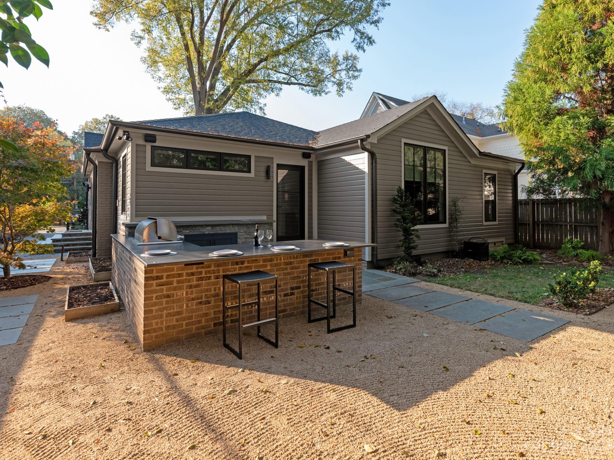2743 Normandy Road Charlotte, NC 28209 - Photo 42 of 43 a view of house with a outdoor seating
