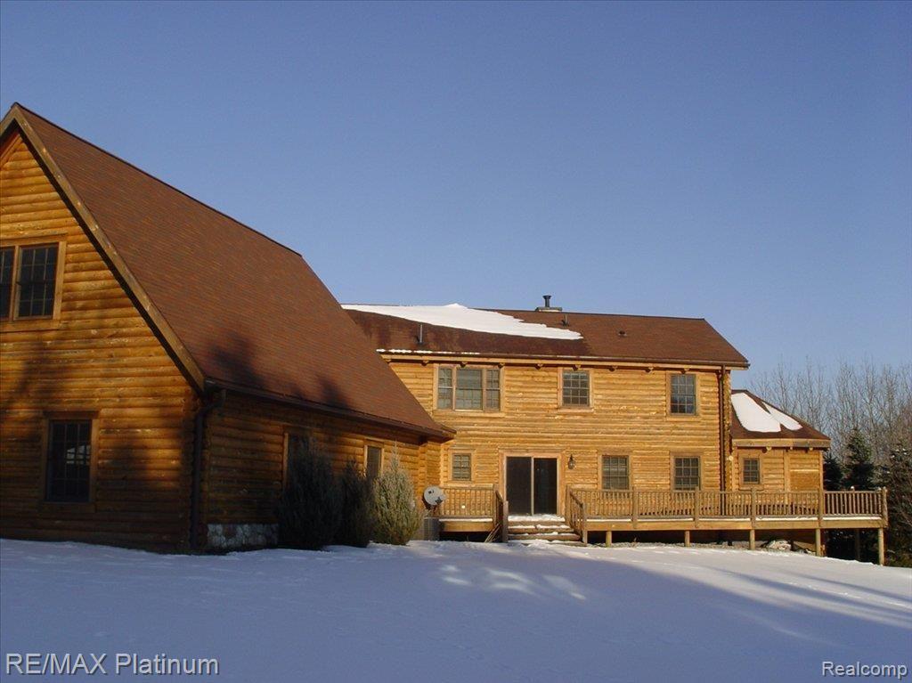 8095 Stonehedge Road Gregory, MI 48137 - Photo 14 of 19 stonehedge winter back ext