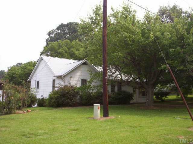 55 Wrenon Roxboro, NC 27573 - Photo 1 of 1 a view of a house with backyard and trees
