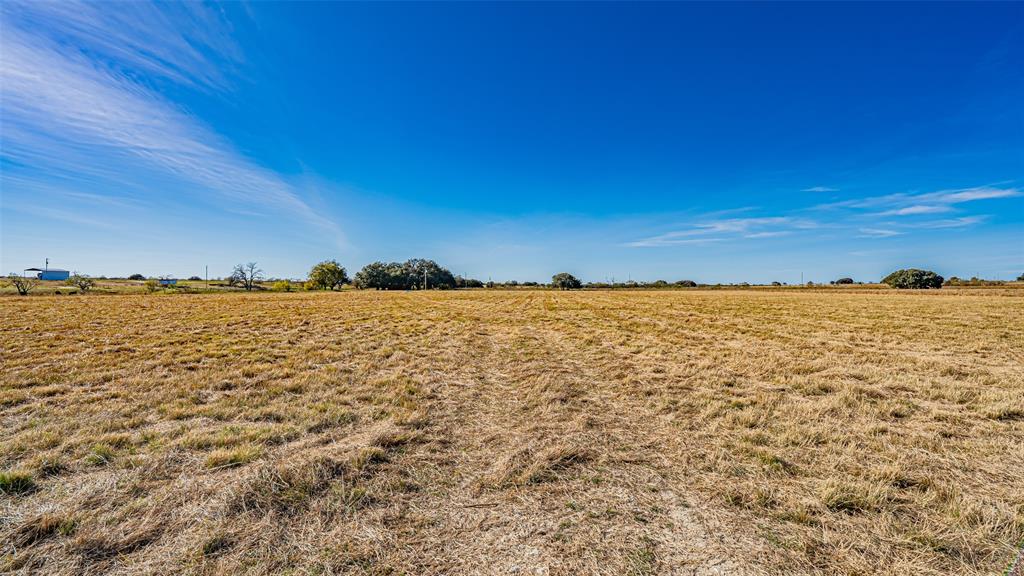3700 County Road 330 Dublin, TX 76446 - Photo 24 of 28 a view of a large body of water with a building in the background