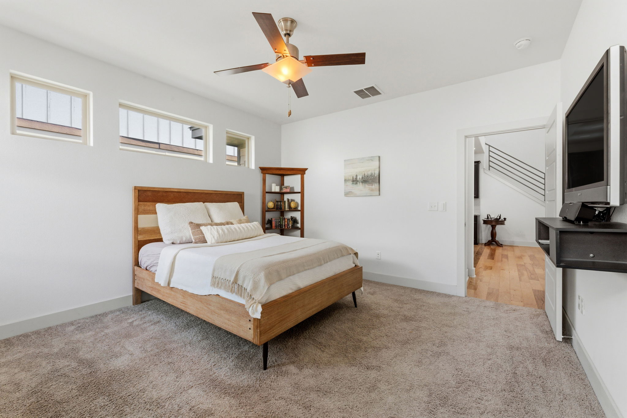 1007 Totis Road Austin, TX 78748 - Photo 23 of 37 a bed room with a bed and a television