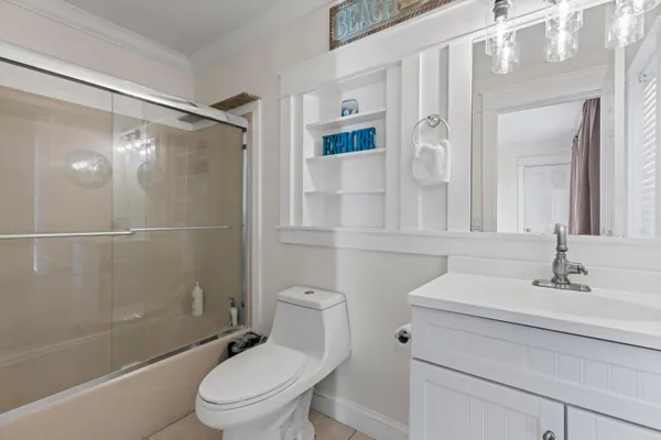 a view of a balcony with wooden floor