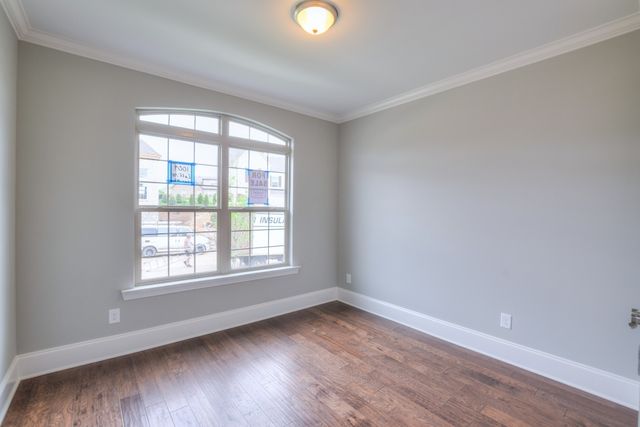 an empty room with closet area