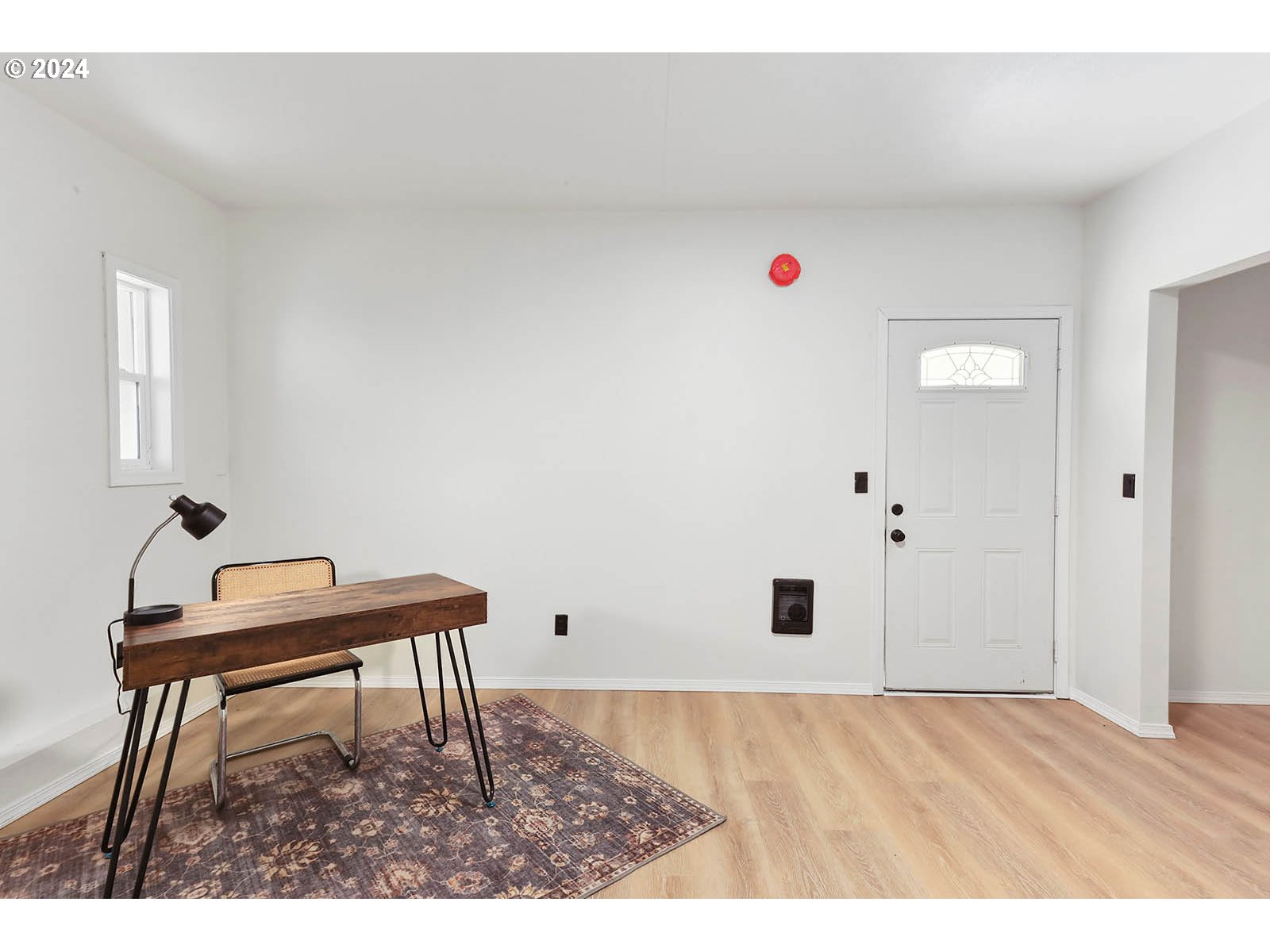 1710 B Street Hood River, OR 97031 - Photo 12 of 42 a workspace with furniture and wooden floor